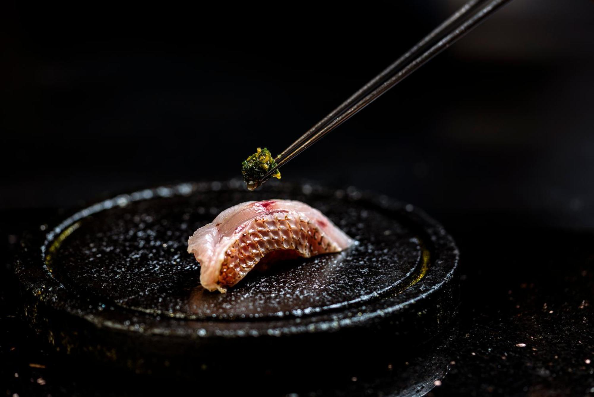 Vie Hotel Bangkok - Mgallery Collection Exterior photo A piece of sushi being seasoned with shichimi tōgarashi